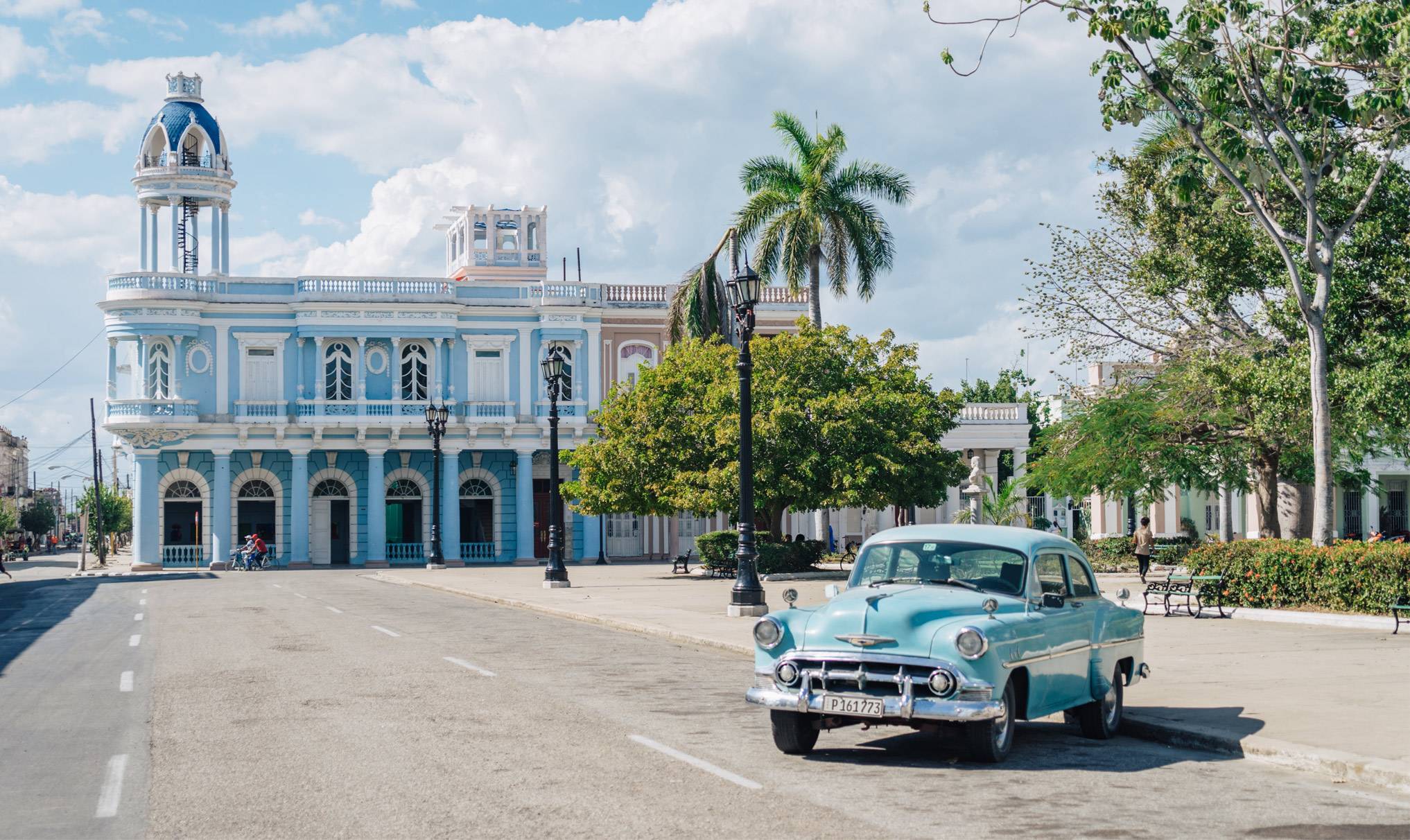 A sky blue 1950’s Chevy in a plaza in the city of Cienfuegos, Cuba